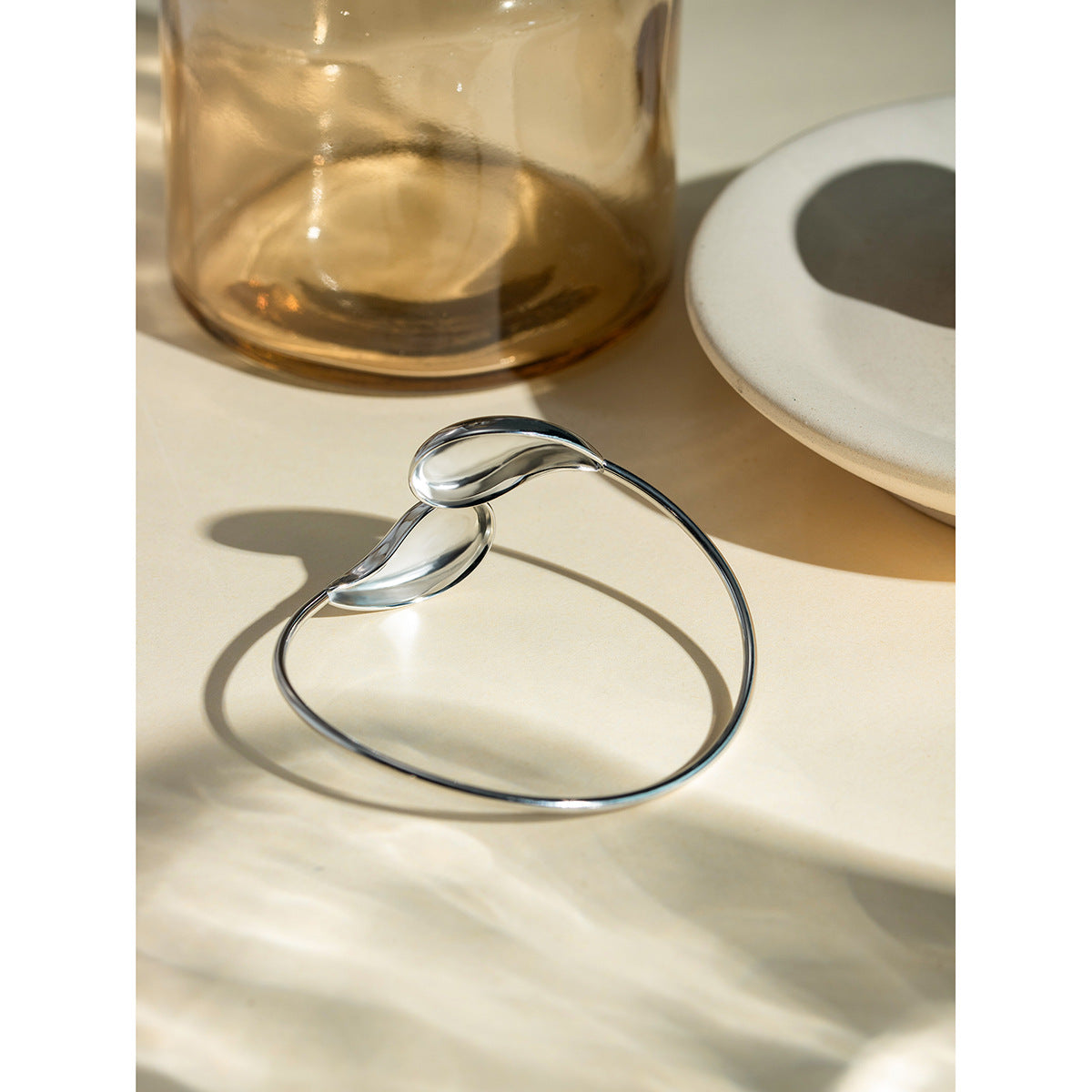 AMBASADOR Sculptural Water-Drop Twist Cuff