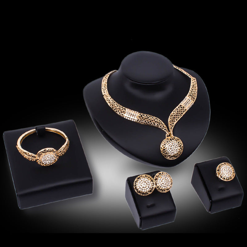 Gold-tone necklace, bracelet, ring and earrings set