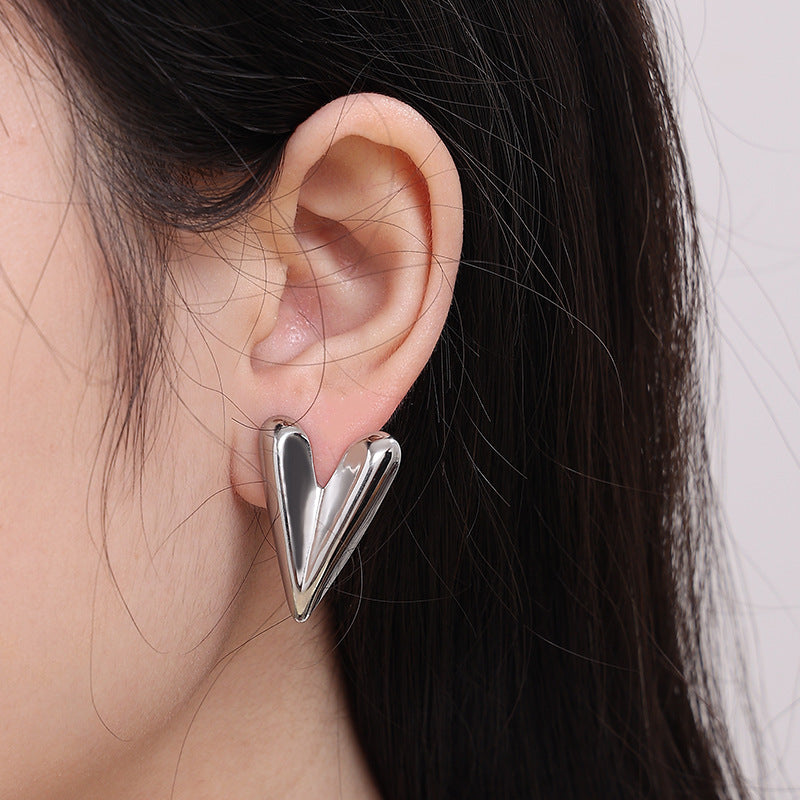 AMBASADOR Sculpted Heart Steel Stud Earrings